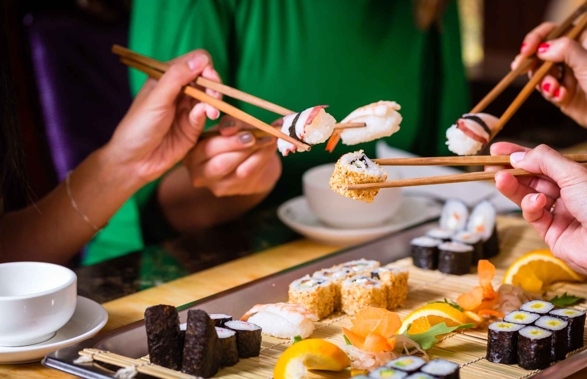 People sharing Japanese food