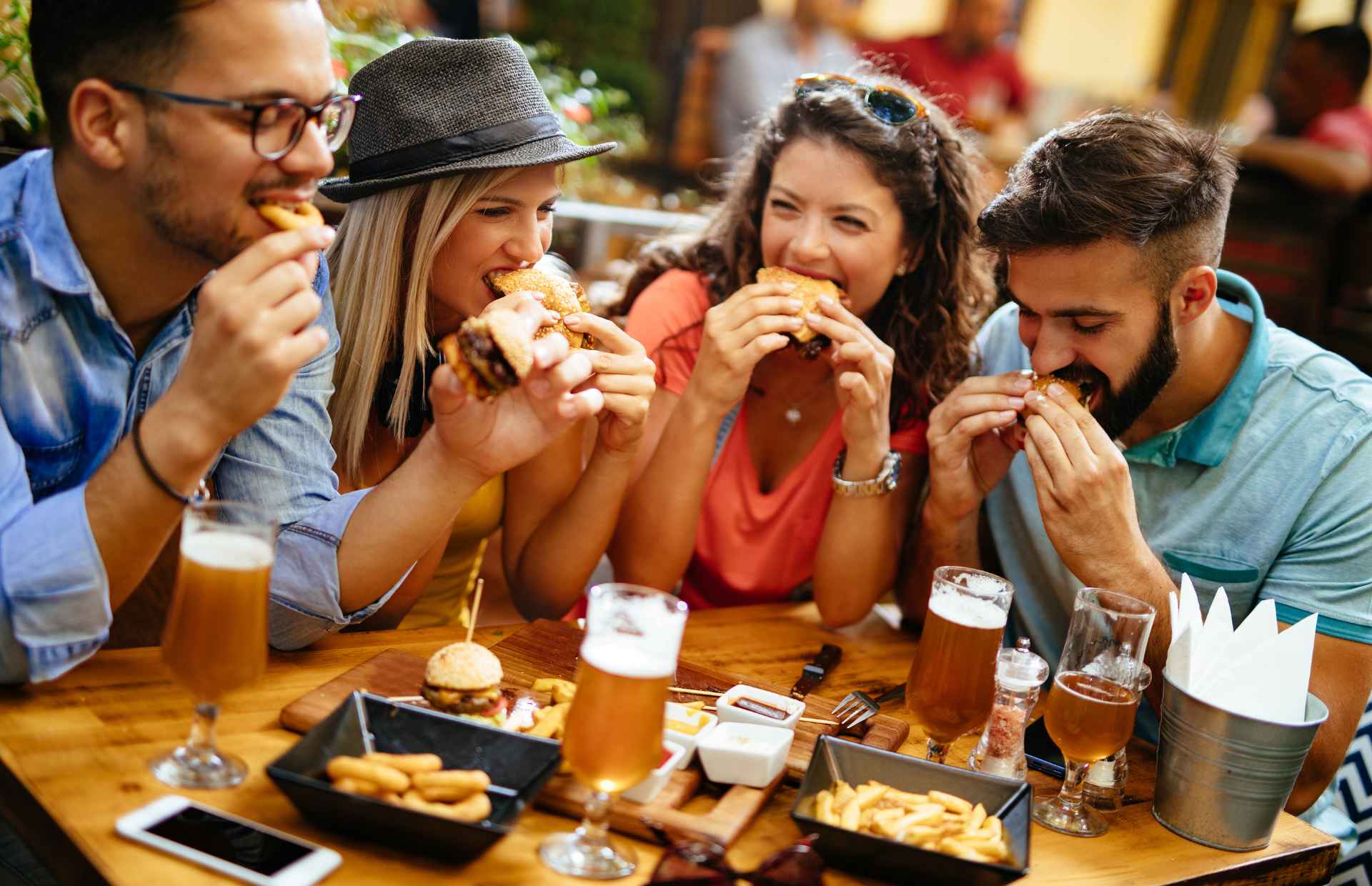 Group of friends enjoying burgers