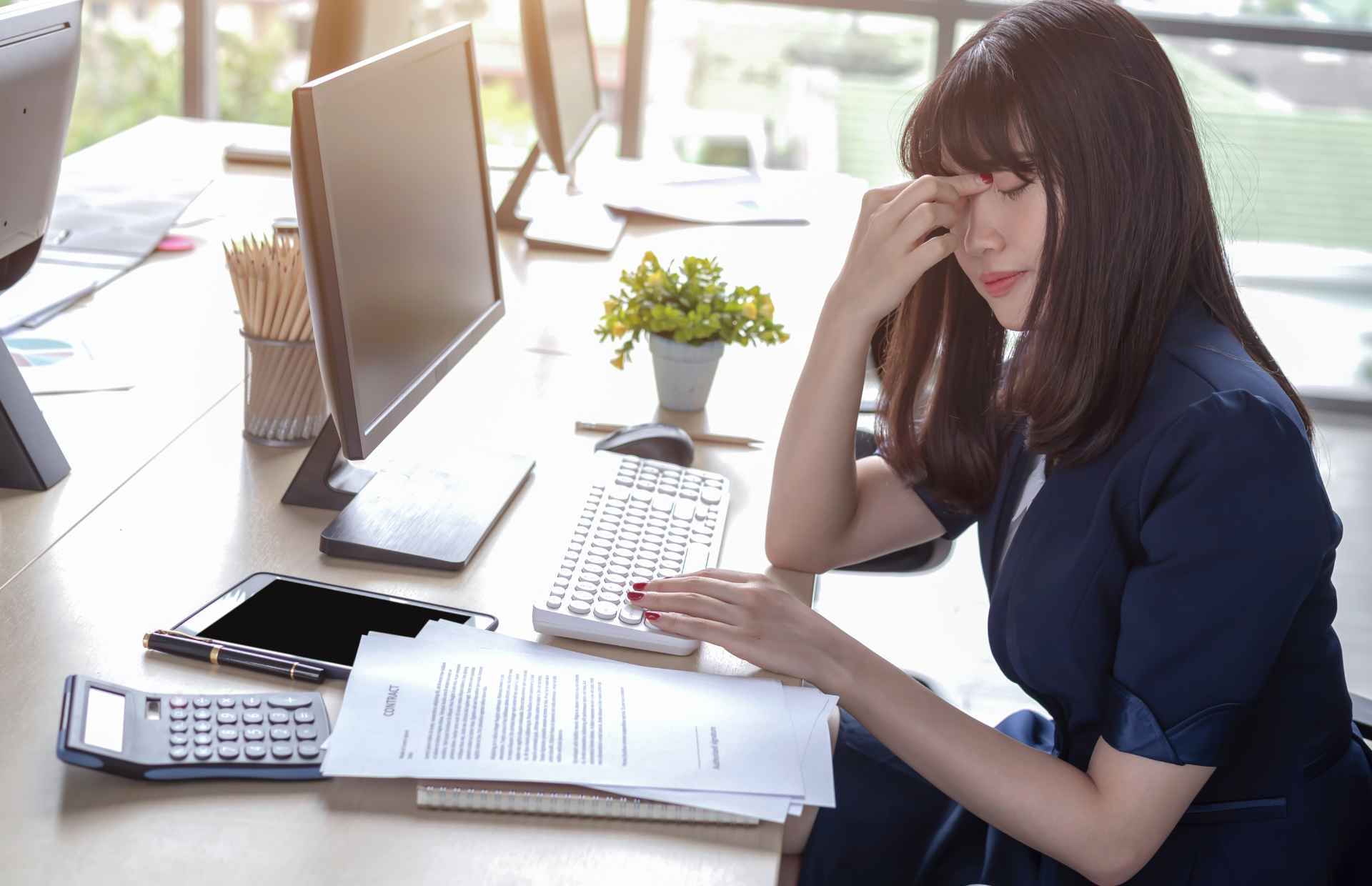 woman extremely stressed at work