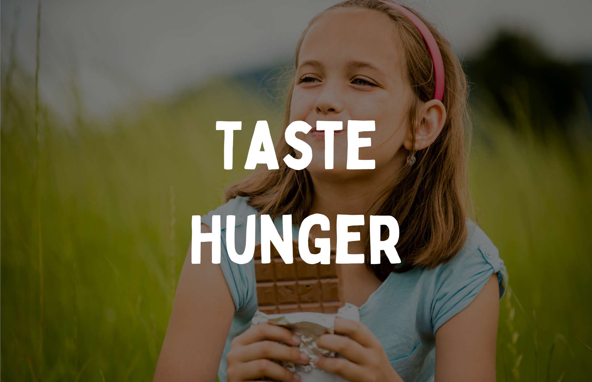 Taste hunger Girl experiencing taste hunger while eating chocolate